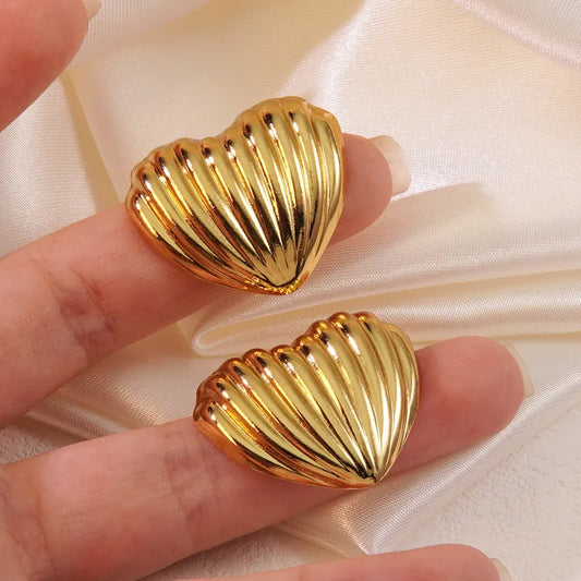 Aretes dorado concha de corazon