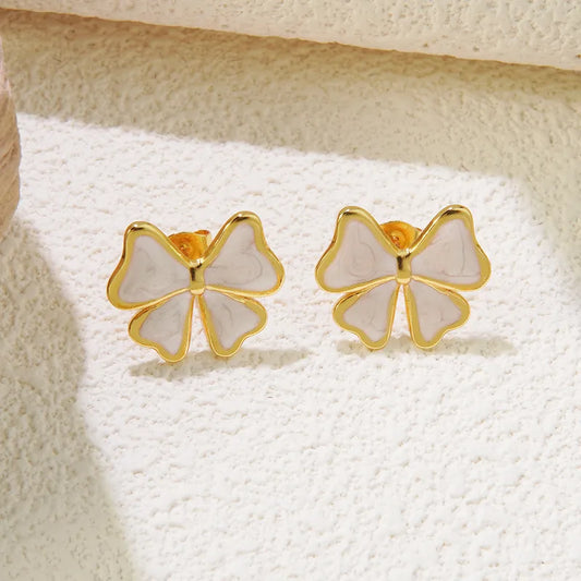Aretes moño blanco